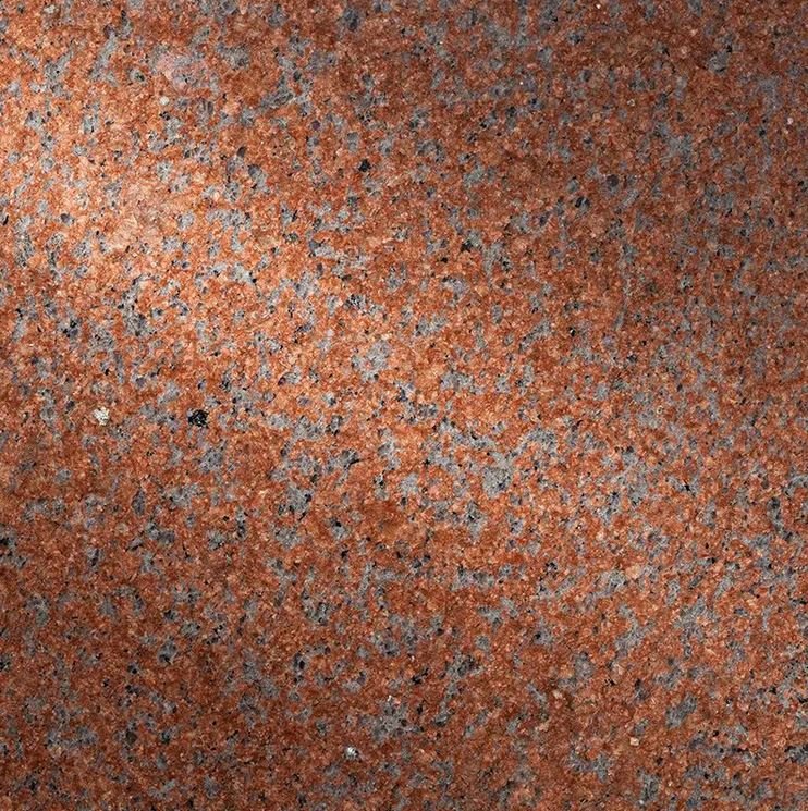 Close view of polished Mountain Red memorial granite